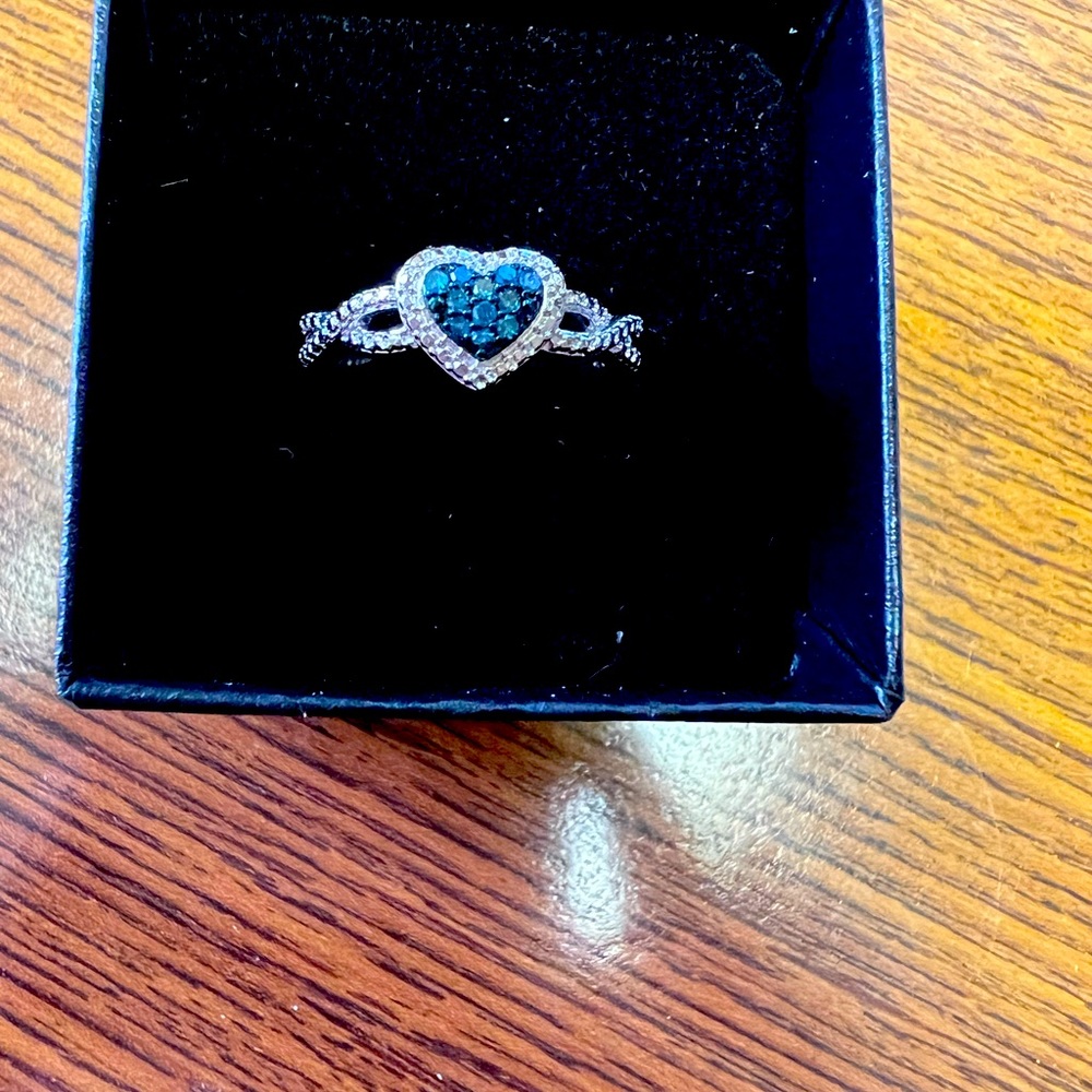 Size 7. Diamond and Tanzanite ring.
